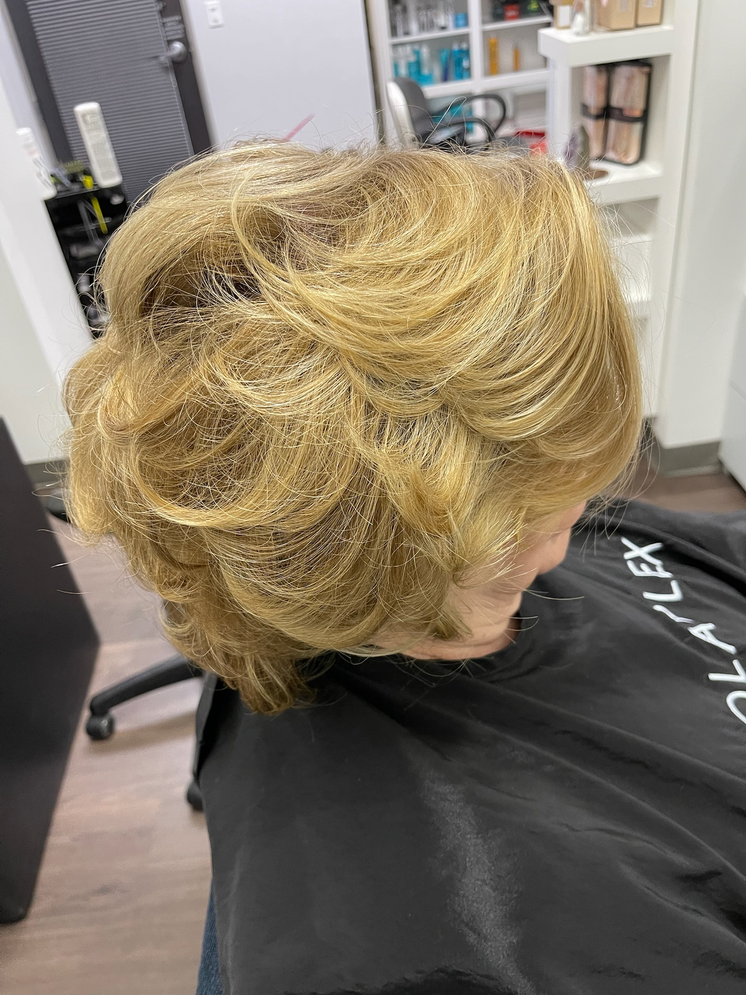 Client with hand-tied weft extensions installed by Tiara